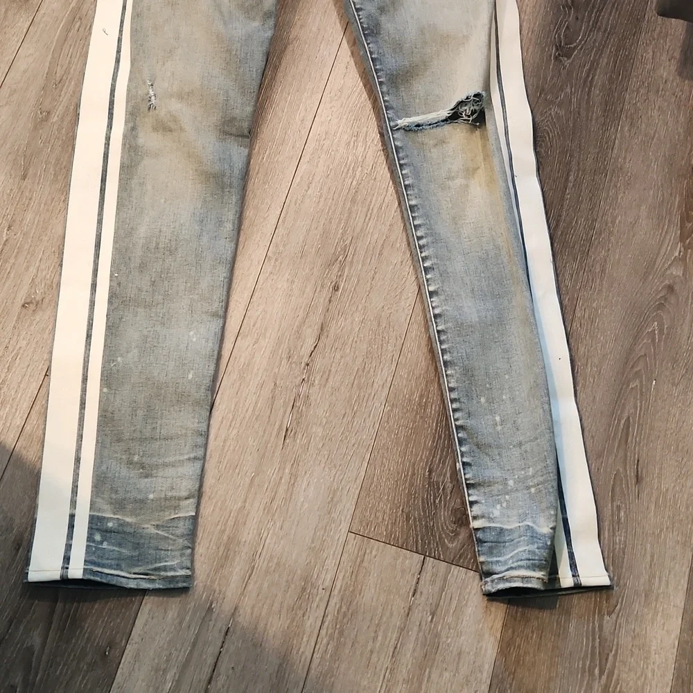 AMIRI Blue and White Skinny Jeans with Distressed Details